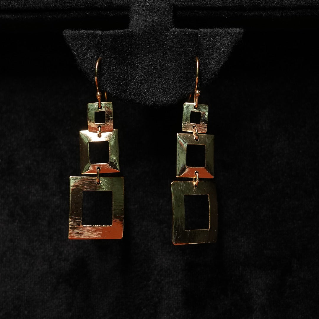 TRIKA FROM EARRINGS