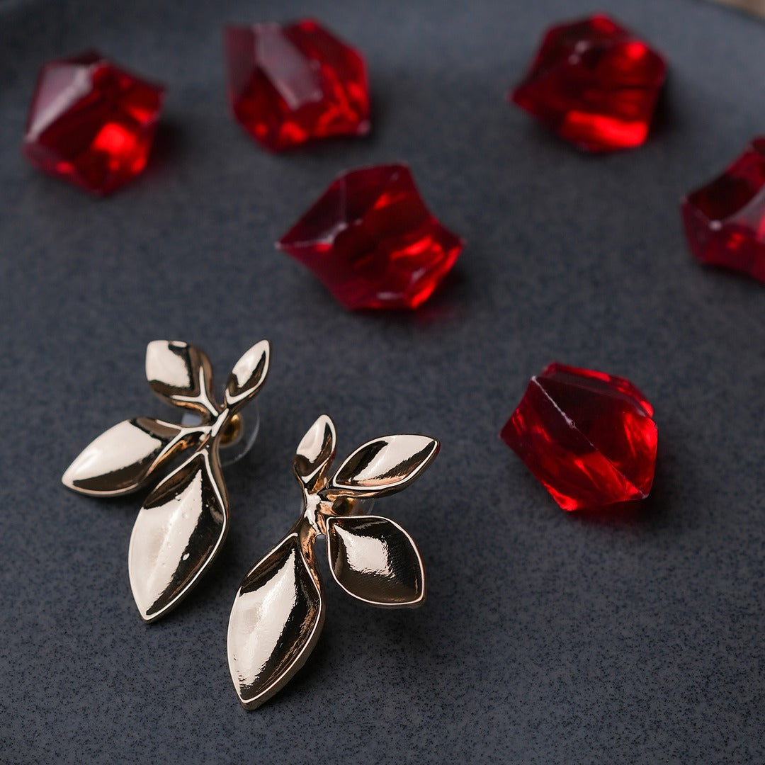 HALF FLOWER STATEMENT EARRINGS