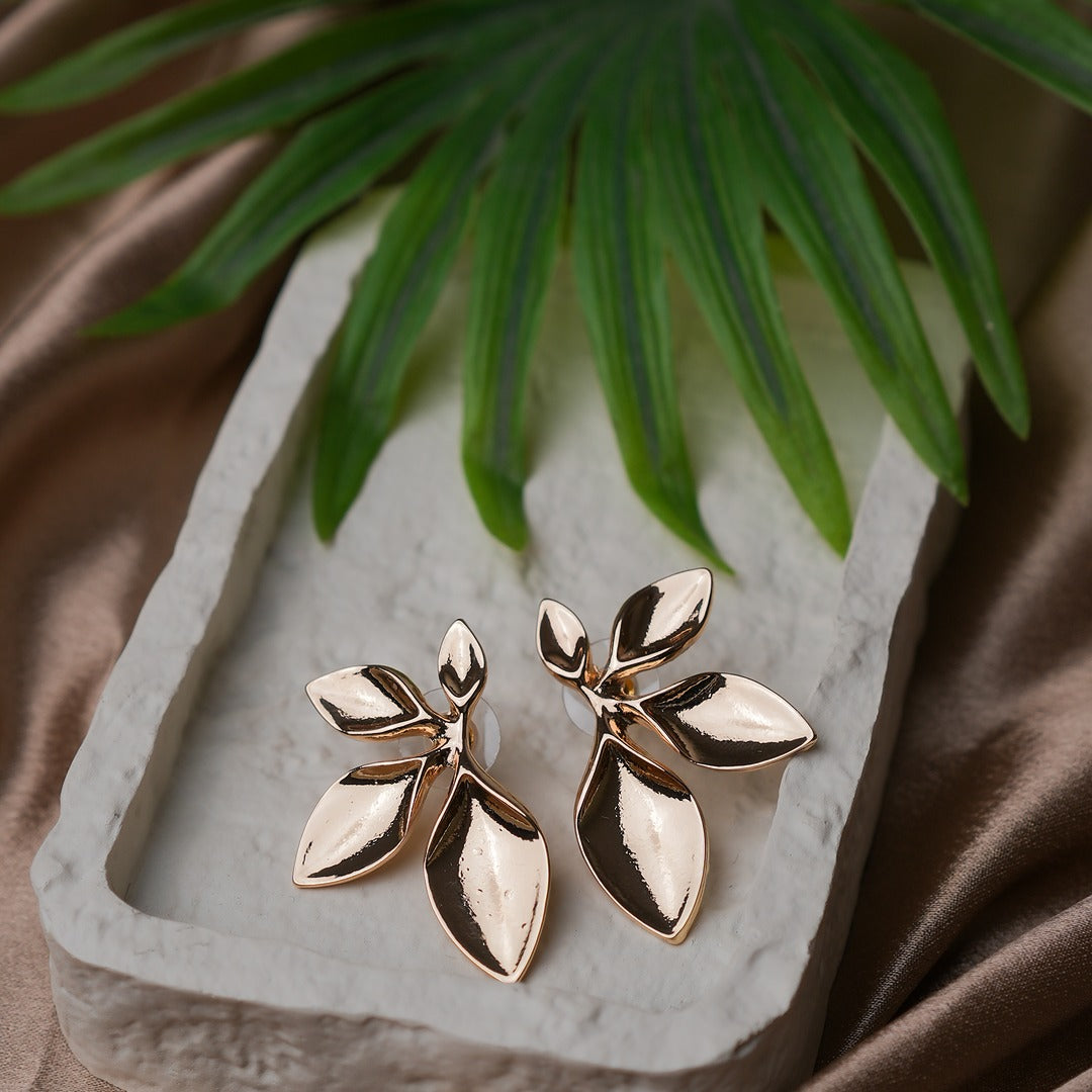 HALF FLOWER STATEMENT EARRINGS